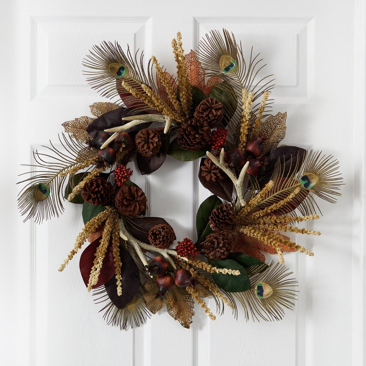 27" Magnolia Leaf Berry Antler and Peacock Feather Wreath